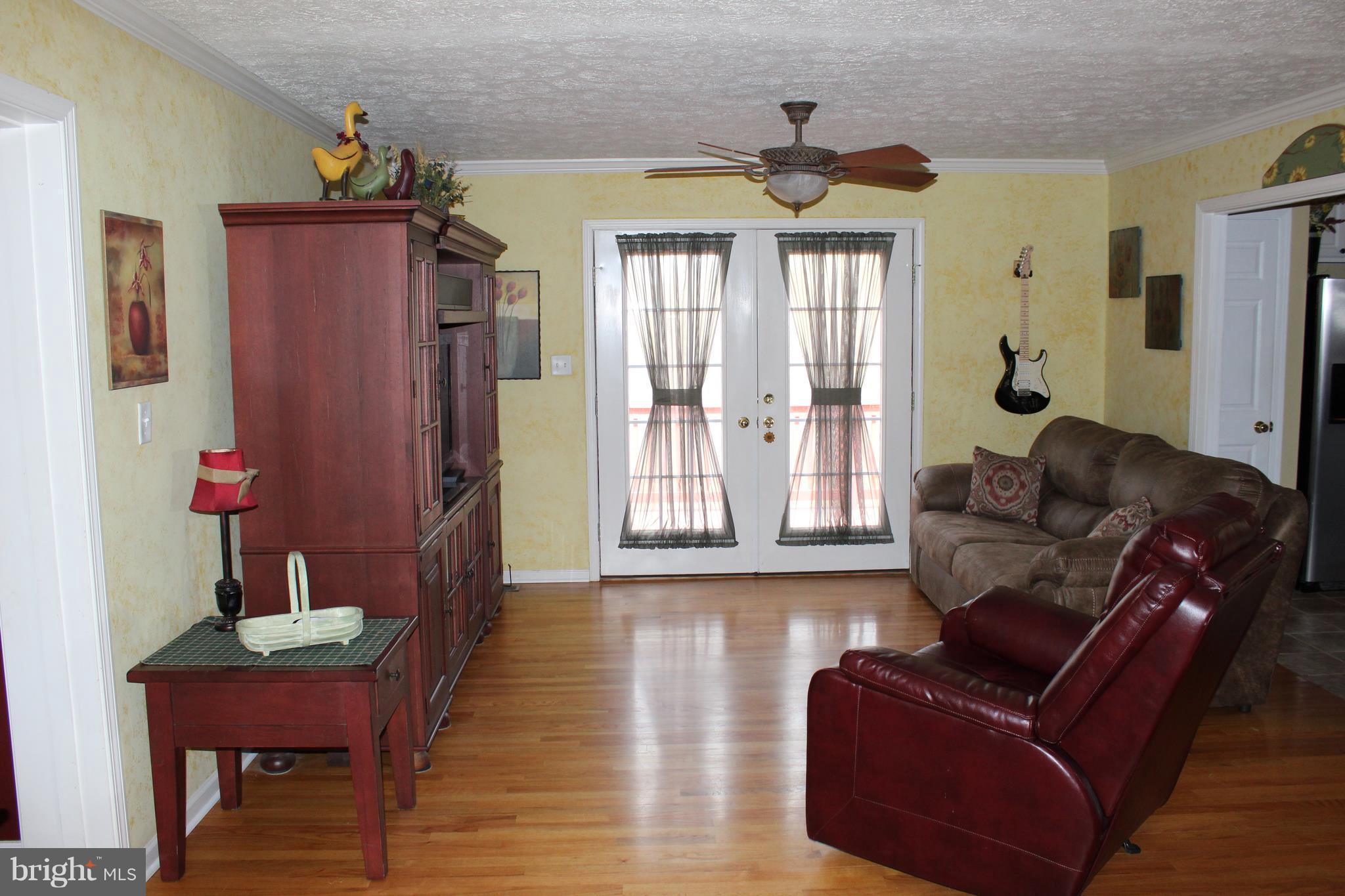3307 Cabin Road Reva, VA 22735 - Photo 4 of 30 a living room with furniture and wooden floor