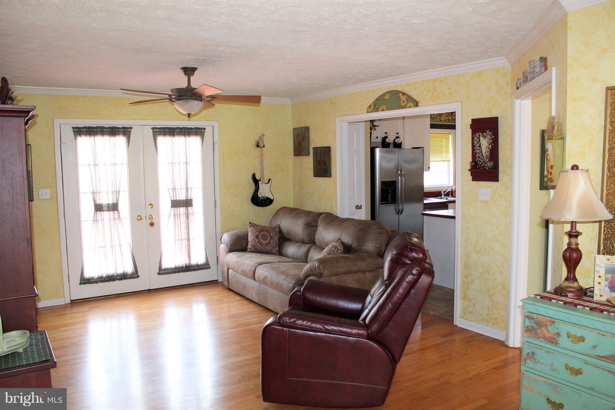3307 Cabin Road Reva, VA 22735 - Photo 5 of 30 a living room with furniture and wooden floor