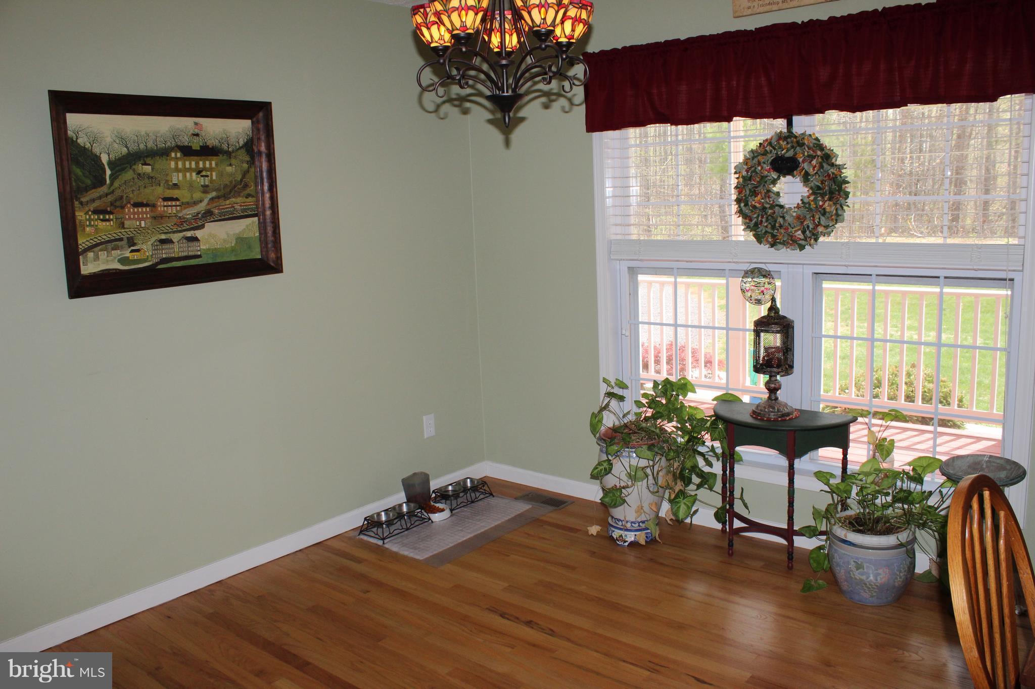 3307 Cabin Road Reva, VA 22735 - Photo 6 of 30 a view of a workspace with furniture and a window