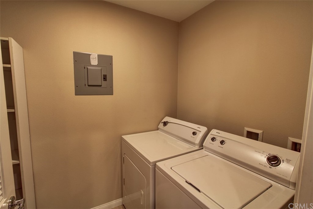 16073 Gables Loop Whittier, CA 90603 - Photo 23 of 31 a utility room with dryer and washer