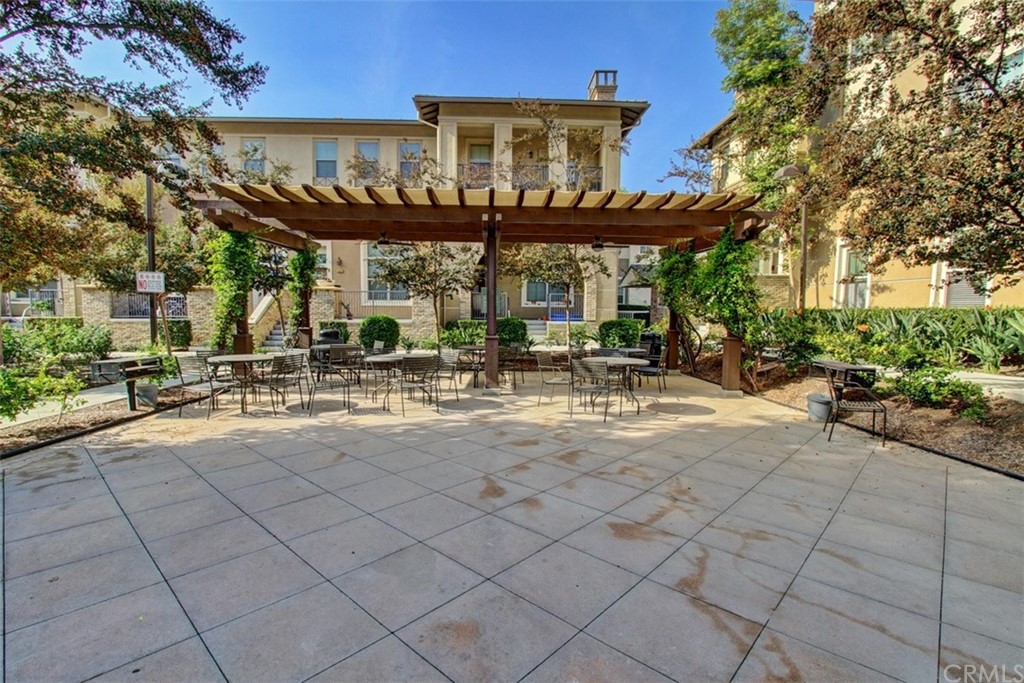 16073 Gables Loop Whittier, CA 90603 - Photo 27 of 31 a view of a building with sitting area