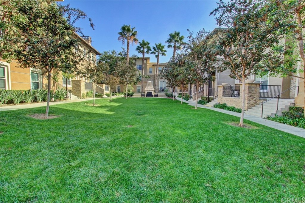 16073 Gables Loop Whittier, CA 90603 - Photo 28 of 31 a view of a house with a yard