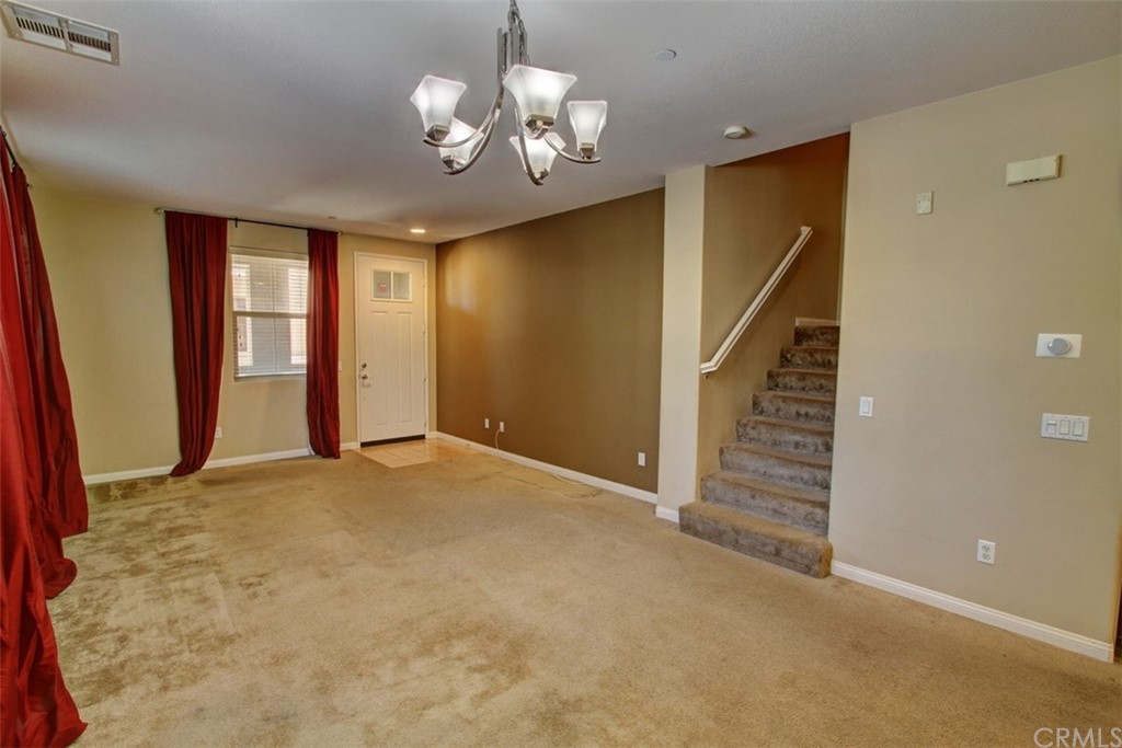 16073 Gables Loop Whittier, CA 90603 - Photo 5 of 31 a view of an empty room with a window