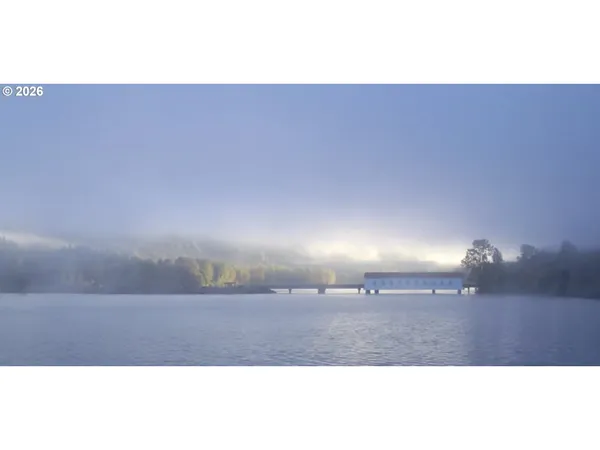a front view of a house with a garage