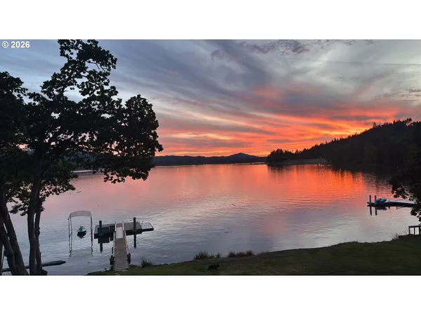 a view of a lake from a yard
