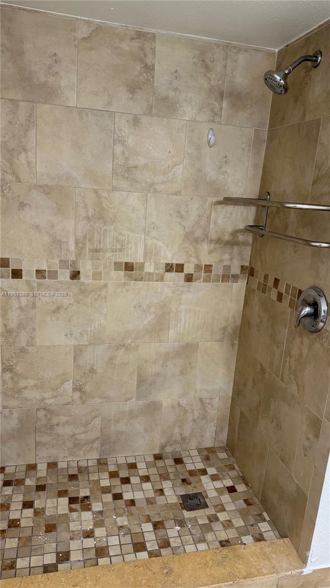 15480 Southwest 284th Street, Unit 2111 Homestead, FL 33033 - Photo 15 of 16 a bathroom with a shower