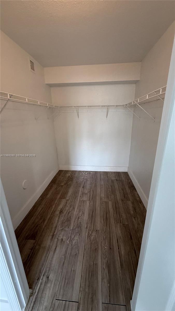 15480 Southwest 284th Street, Unit 2111 Homestead, FL 33033 - Photo 16 of 16 a view of a room with wooden floor