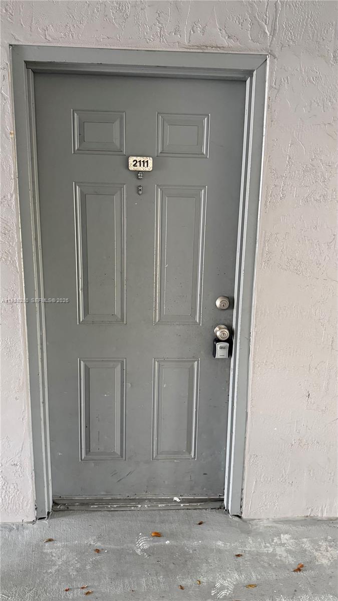15480 Southwest 284th Street, Unit 2111 Homestead, FL 33033 - Photo 2 of 16 a view of a door