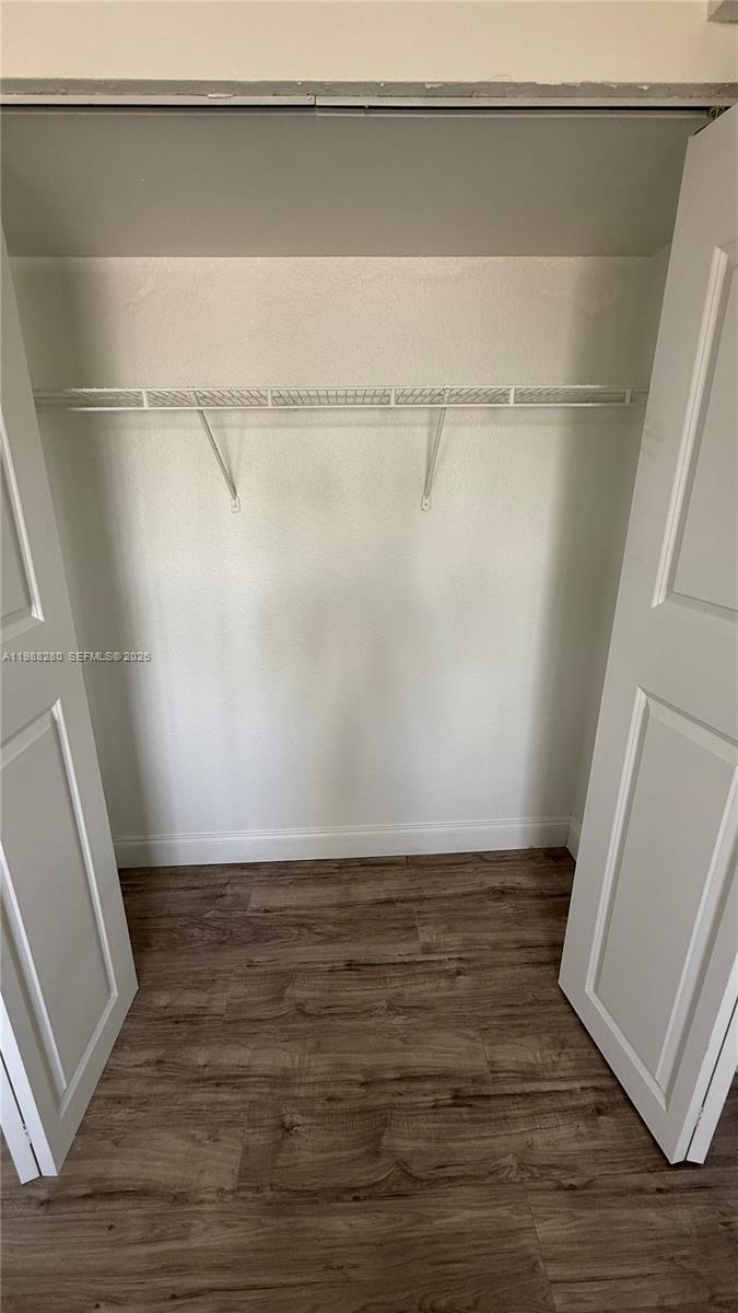 15480 Southwest 284th Street, Unit 2111 Homestead, FL 33033 - Photo 10 of 16 a view of an empty walk in closet