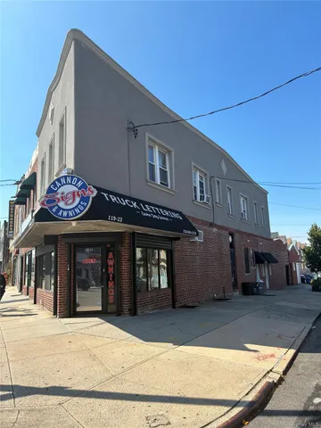 a front view of a building with retail shop