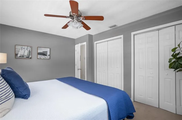 a view of a backyard with swimming pool