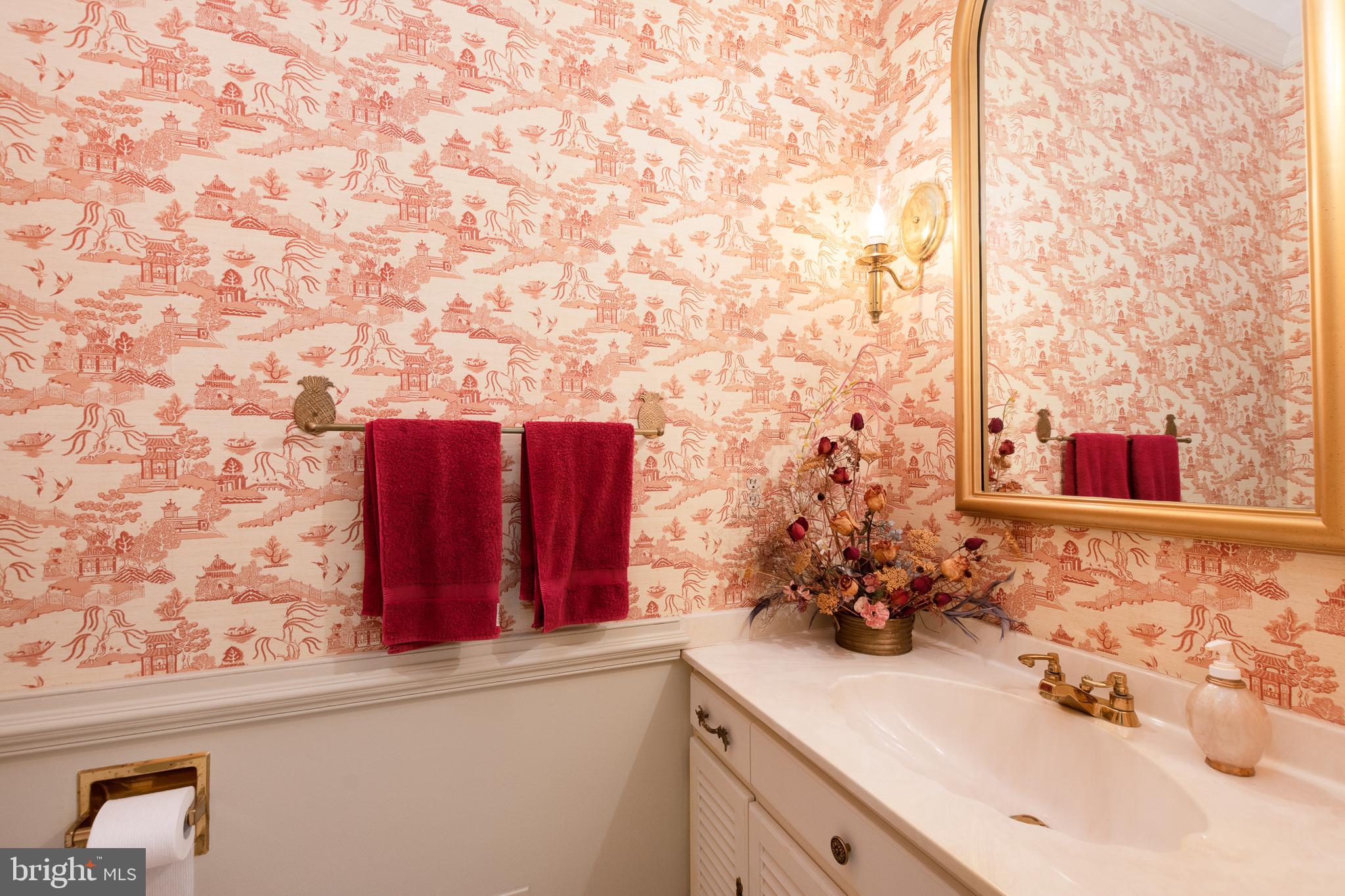 301 High Ridge Road Wilmington, DE 19807 - Photo 34 of 70 a bathroom with a sink and a mirror
