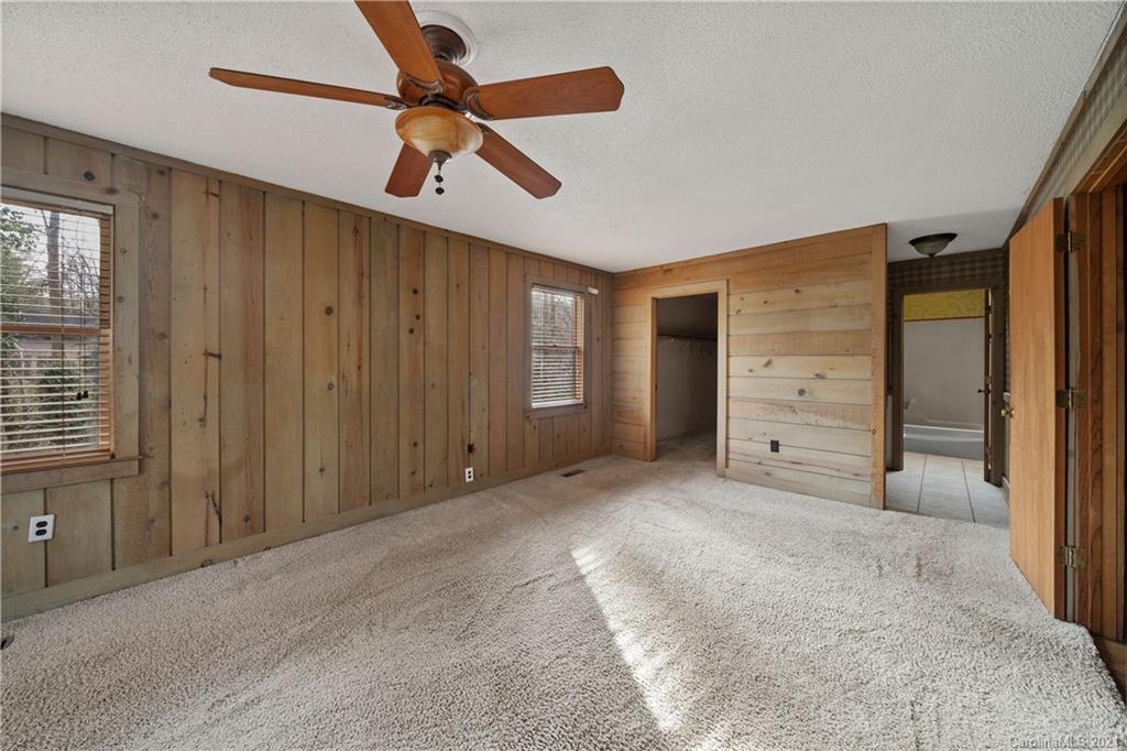 153 Miller Drive Tryon, NC 28782 - Photo 16 of 28 a view of an empty room with a cabinet