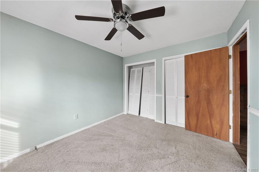 153 Miller Drive Tryon, NC 28782 - Photo 19 of 28 an empty room with fan