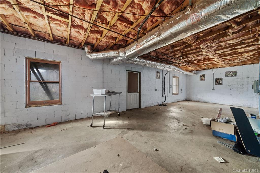 153 Miller Drive Tryon, NC 28782 - Photo 24 of 28 a view of a room with wooden walls