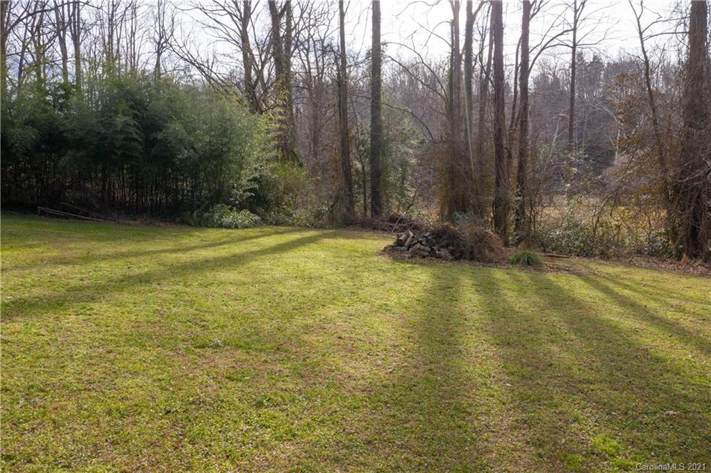 153 Miller Drive Tryon, NC 28782 - Photo 27 of 28 a view of a yard with trees