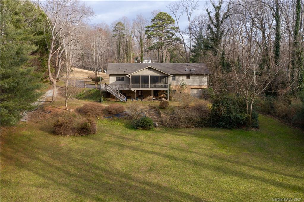 153 Miller Drive Tryon, NC 28782 - Photo 28 of 28 a view of a house with a yard