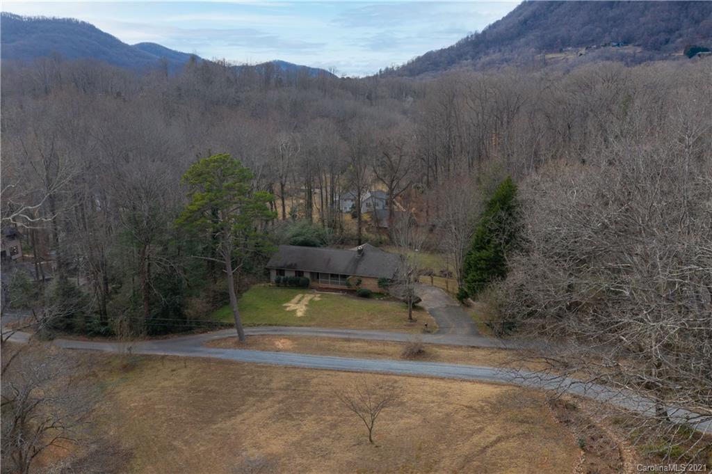 153 Miller Drive Tryon, NC 28782 - Photo 4 of 28 a view of a backyard