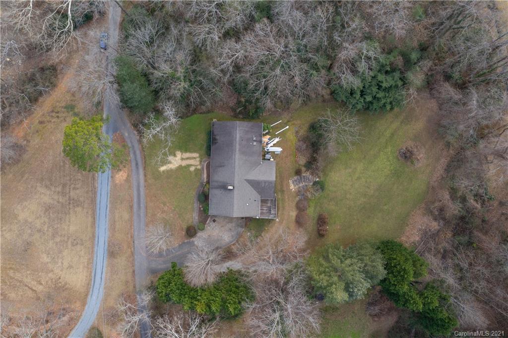 153 Miller Drive Tryon, NC 28782 - Photo 5 of 28 an aerial view of a house with a yard