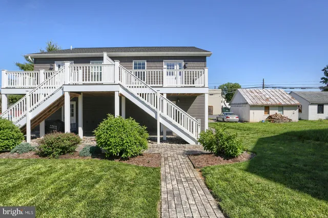 a house view with a garden space