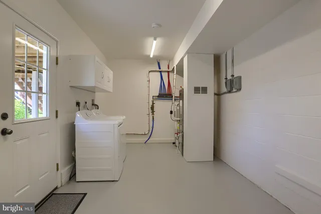 a storage room with washer and dryer