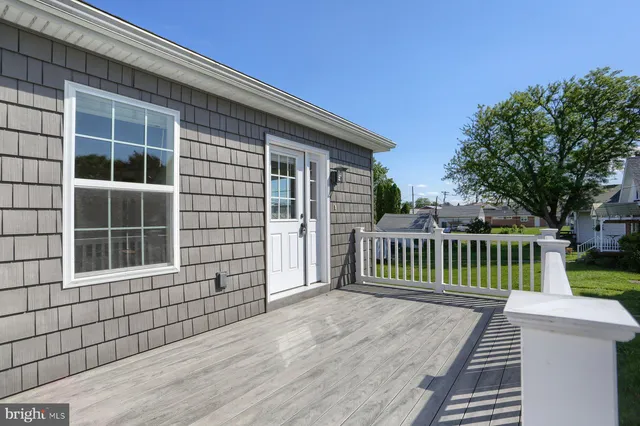 a porch with a bench