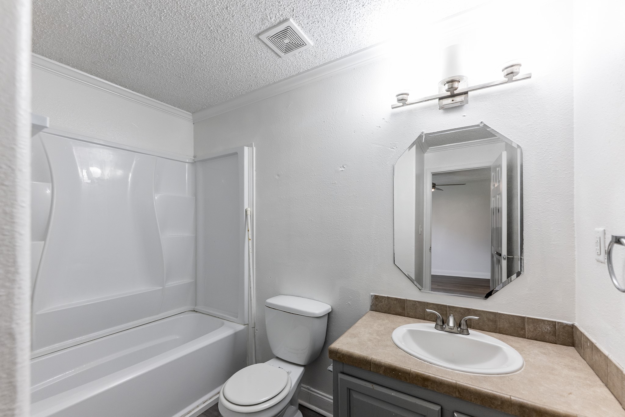 130 Varsity Drive Huntsville, TX 77340 - Photo 16 of 22 Photos show typical layout and finishes; actual unit may vary.