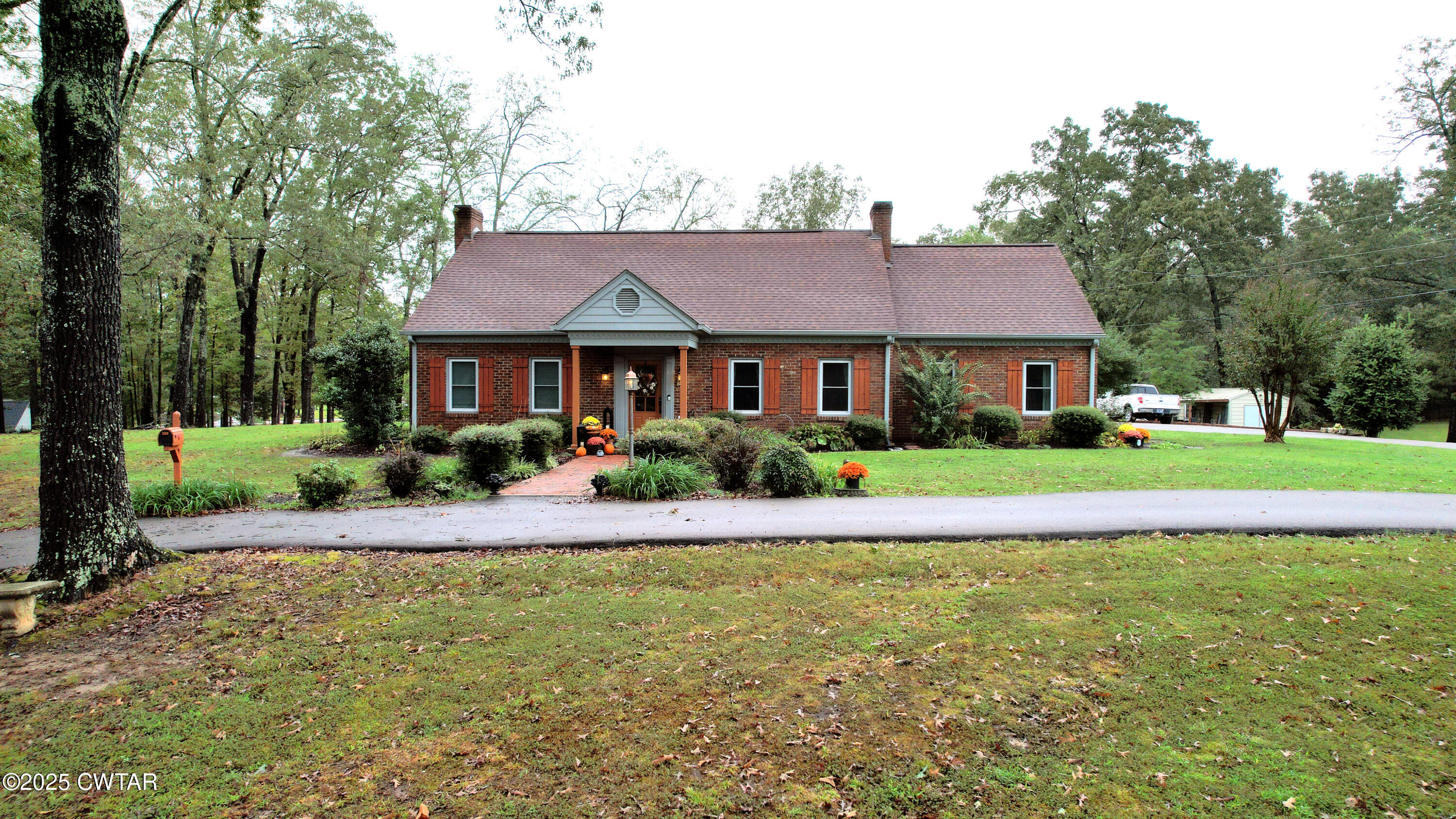 614 Oneal Lane Henderson, TN 38340 - Photo 13 of 69 a front view of a house with a yard