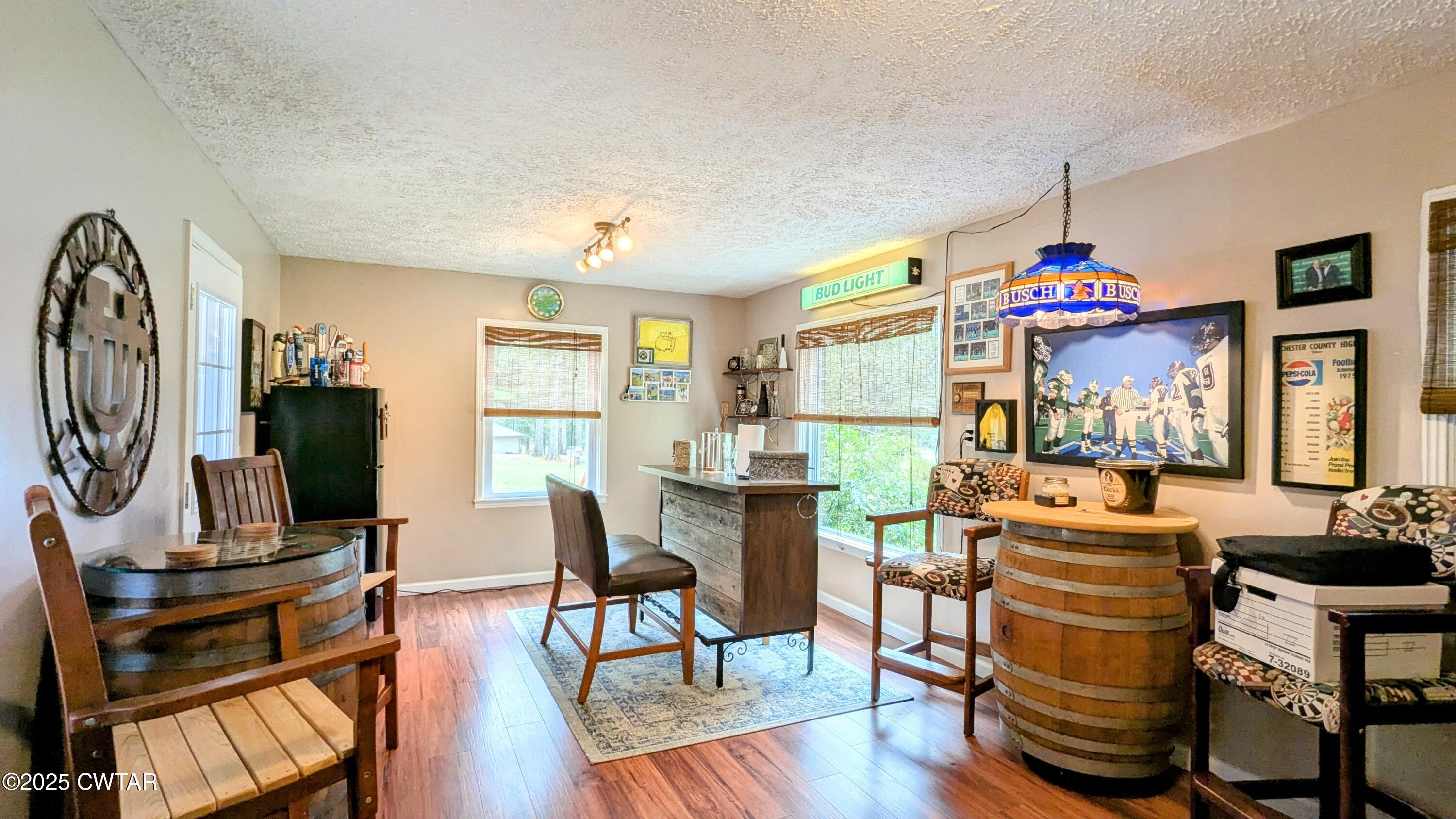 614 Oneal Lane Henderson, TN 38340 - Photo 16 of 69 a view of a dining room with furniture window and wooden floor