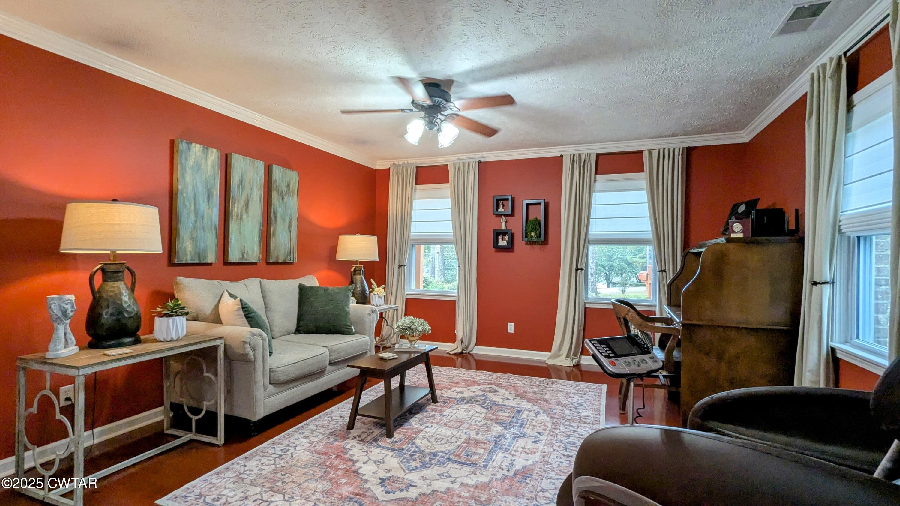 614 Oneal Lane Henderson, TN 38340 - Photo 31 of 69 a living room with furniture and a window