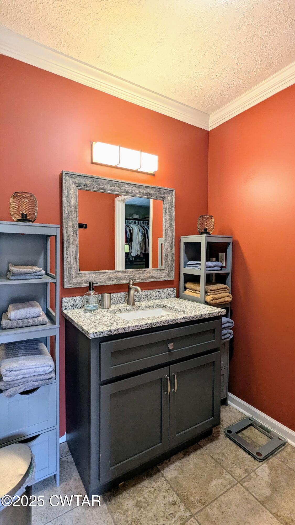 614 Oneal Lane Henderson, TN 38340 - Photo 37 of 69 a kitchen with a stove and a sink