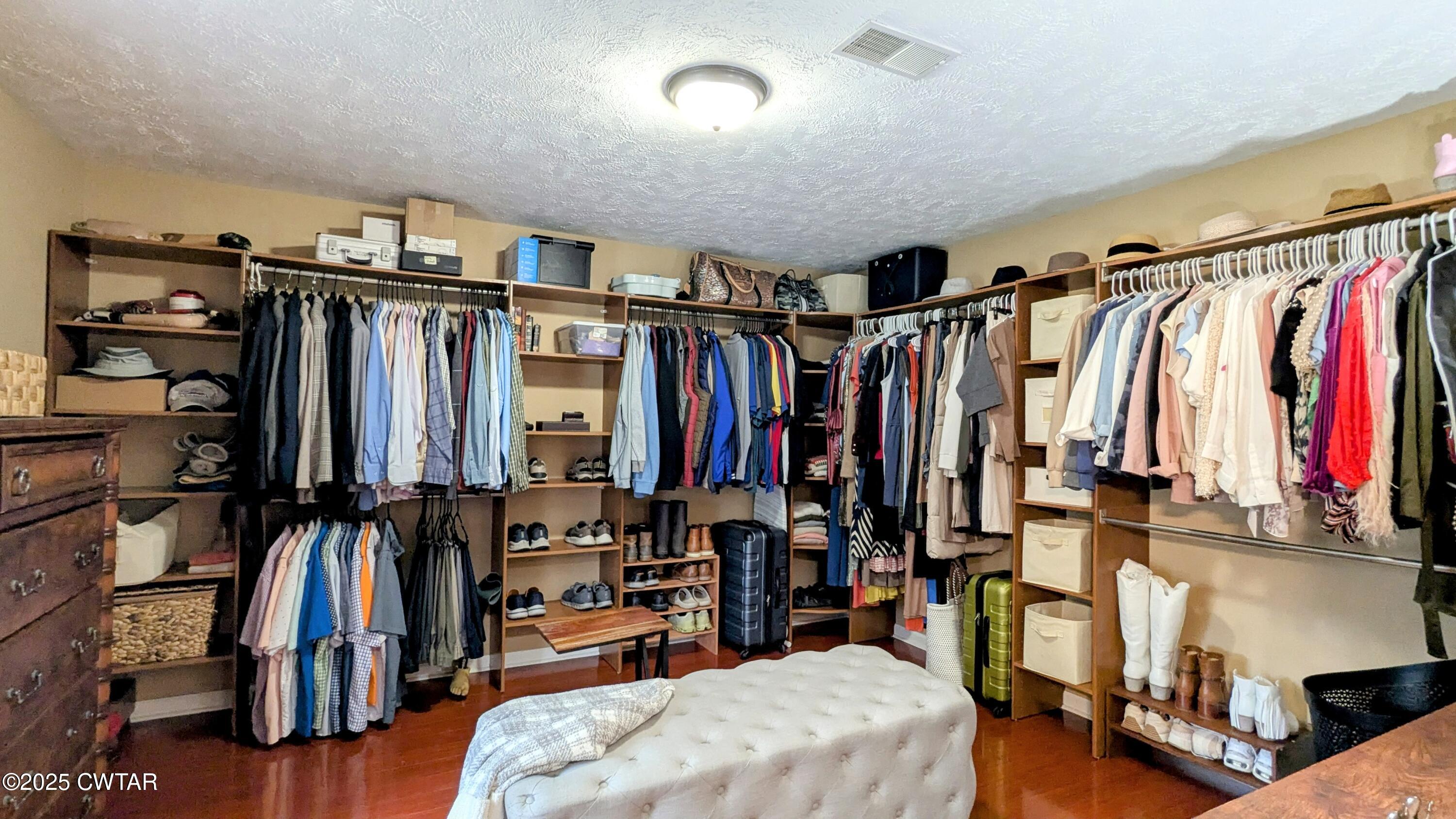 614 Oneal Lane Henderson, TN 38340 - Photo 38 of 69 a view of walk in closet with clothes and shoes
