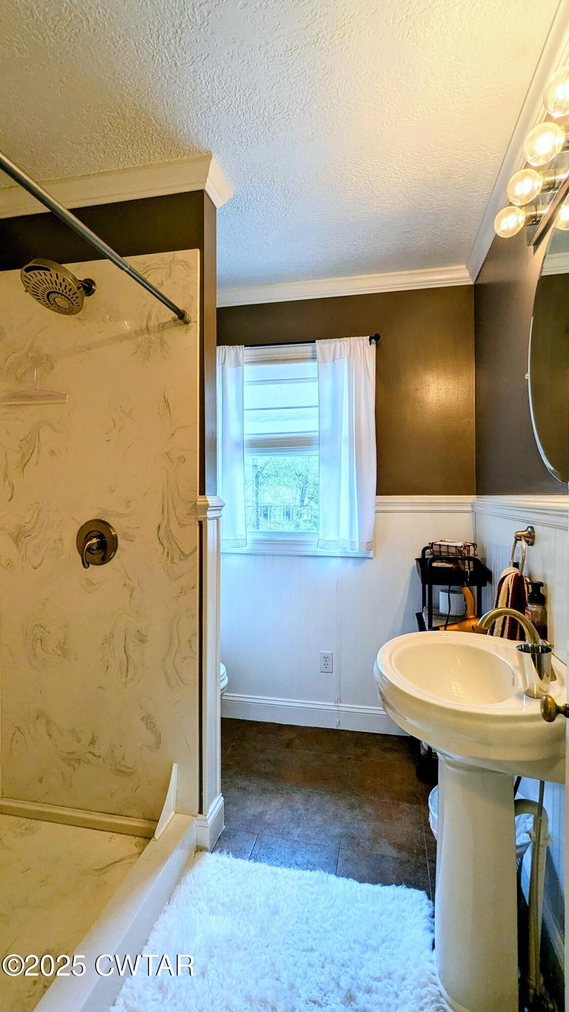 614 Oneal Lane Henderson, TN 38340 - Photo 51 of 69 a bathroom with a sink toilet and shower