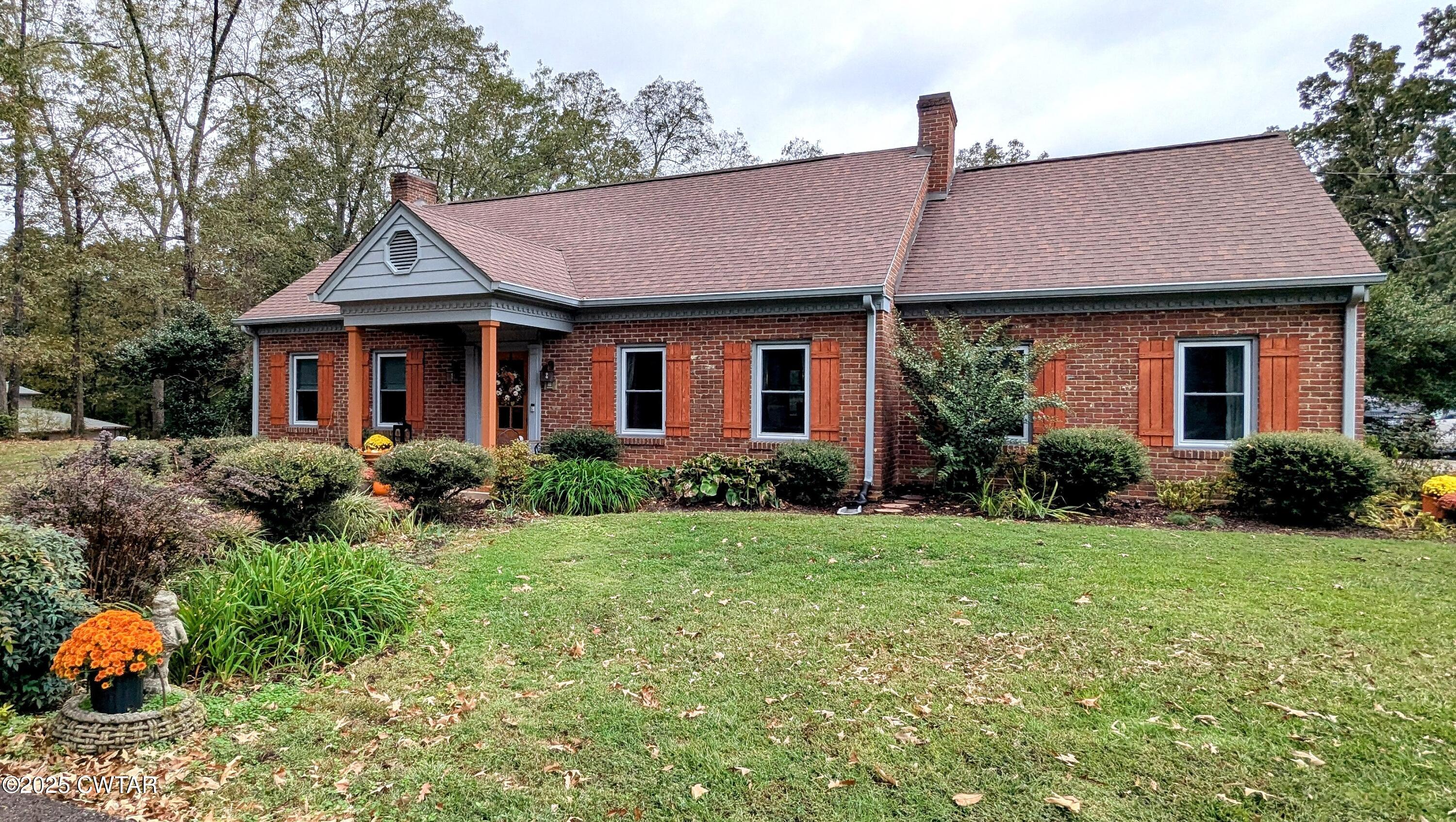 614 Oneal Lane Henderson, TN 38340 - Photo 60 of 69 a front view of a house with a yard