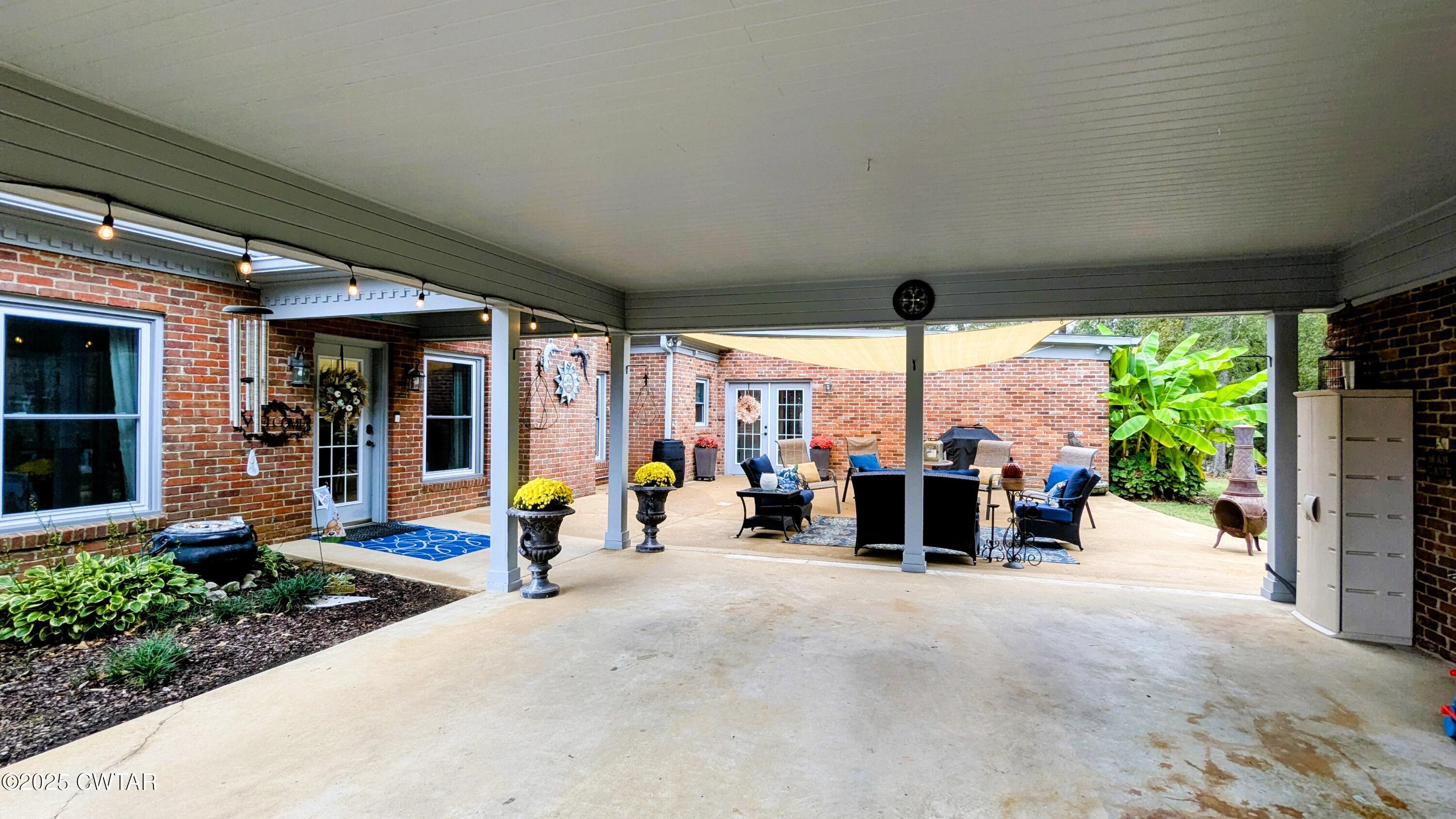 614 Oneal Lane Henderson, TN 38340 - Photo 65 of 69 a view of a terrace with sitting area