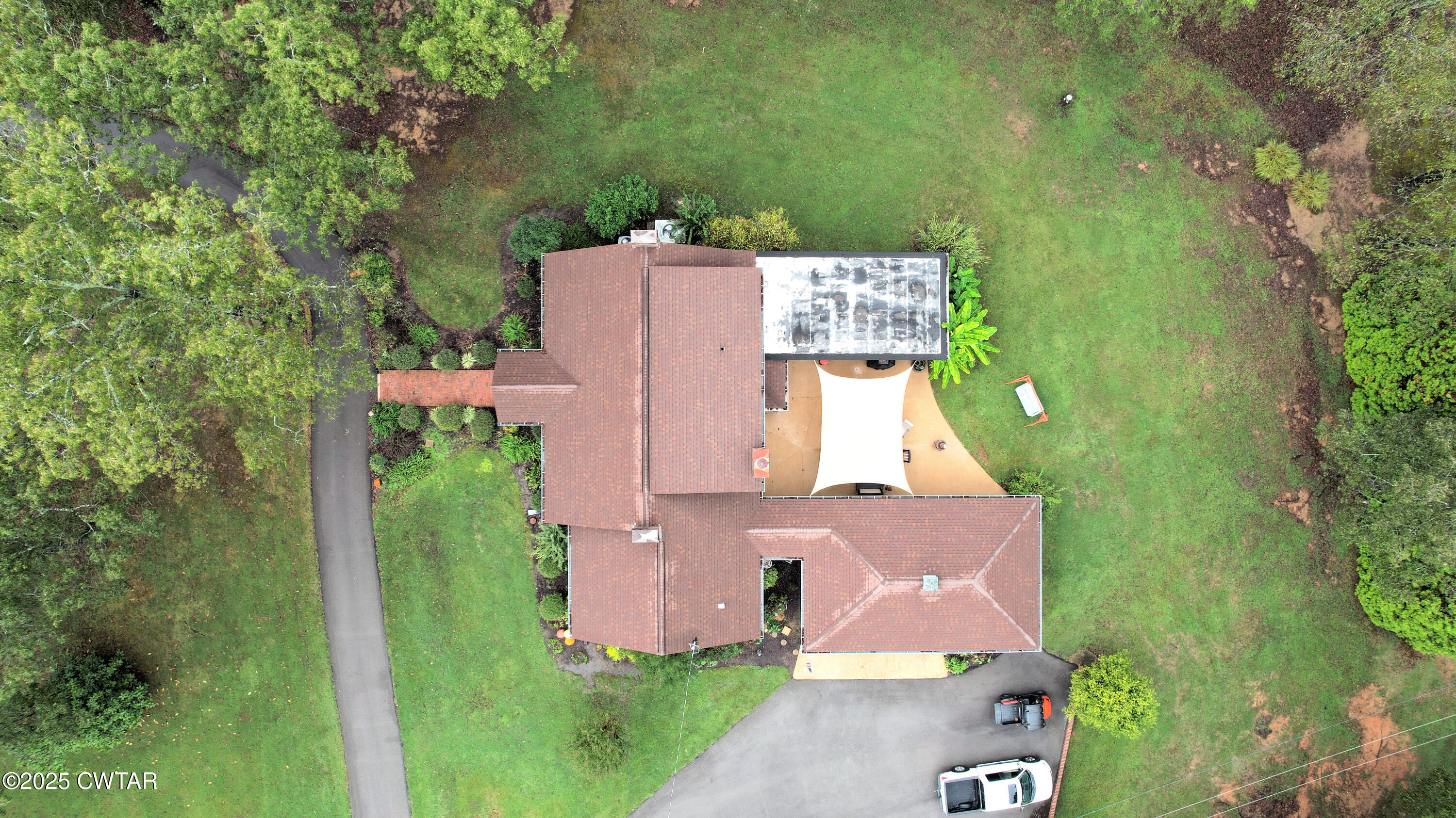 614 Oneal Lane Henderson, TN 38340 - Photo 7 of 69 an aerial view of a house with outdoor space and street view