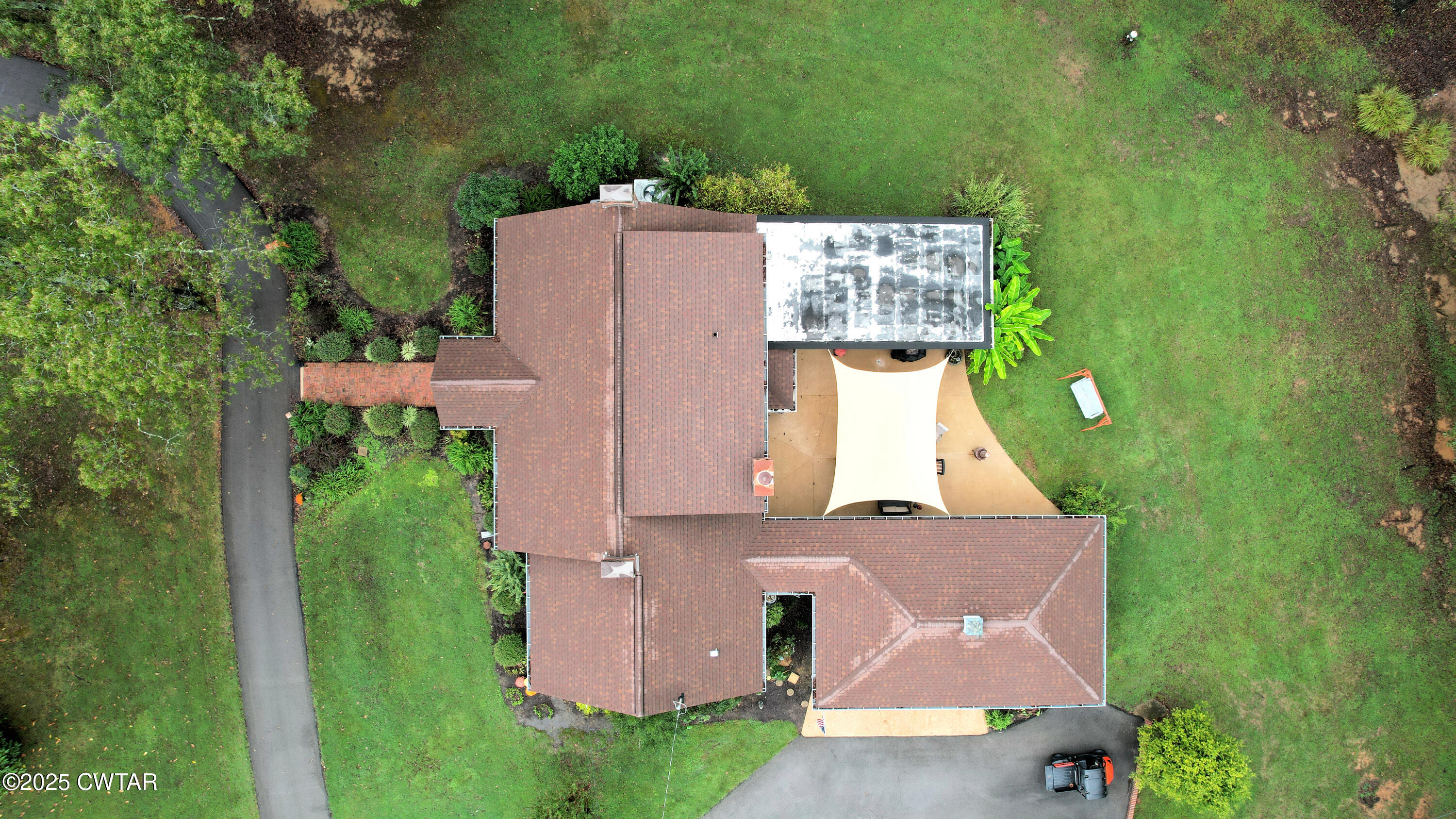 614 Oneal Lane Henderson, TN 38340 - Photo 8 of 69 an aerial view of a house with a garden