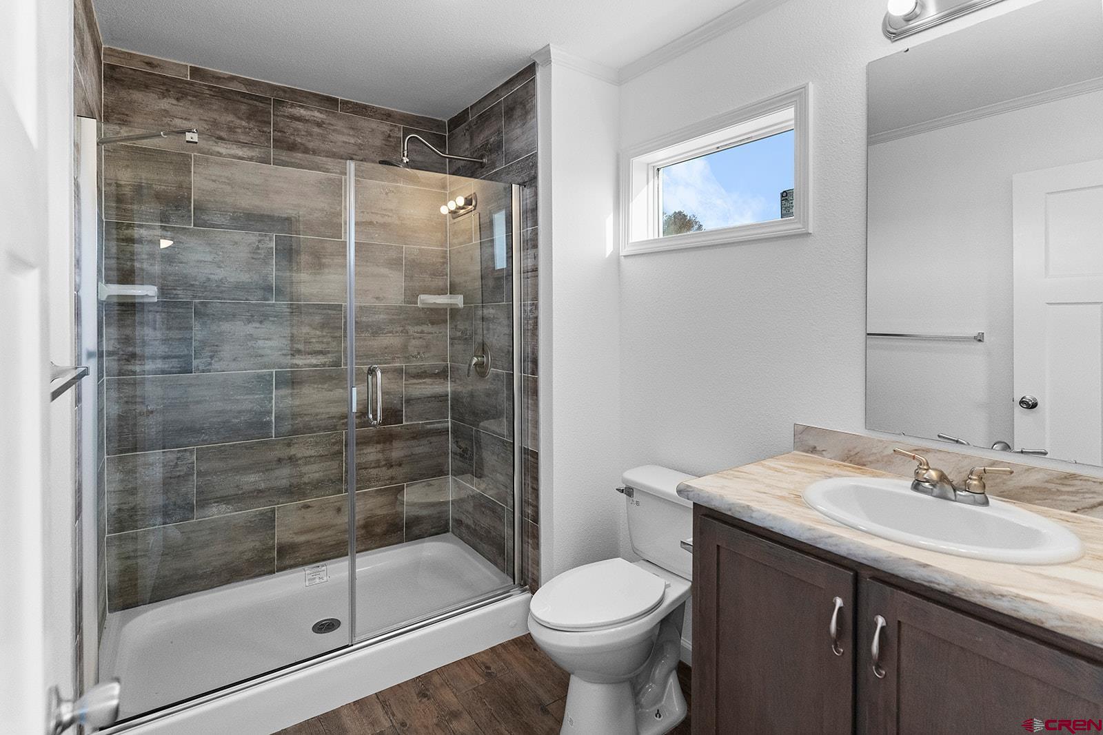 62650 Lasalle Road, Unit 341 Montrose, CO 81403 - Photo 6 of 22 a bathroom with a shower and a sink