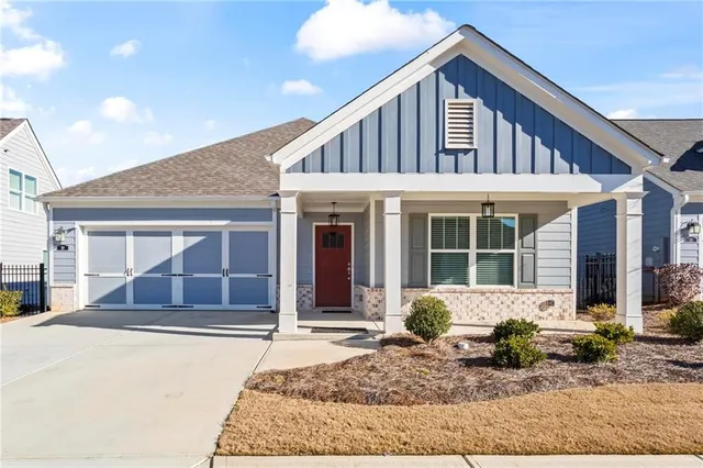 a front view of a house with a porch