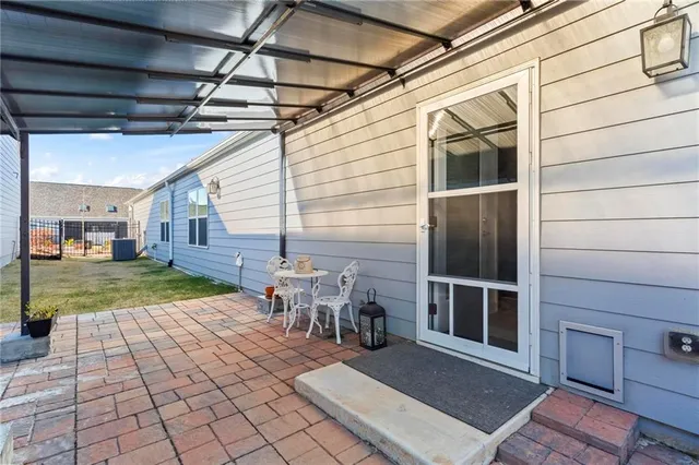 a view of a porch with furniture