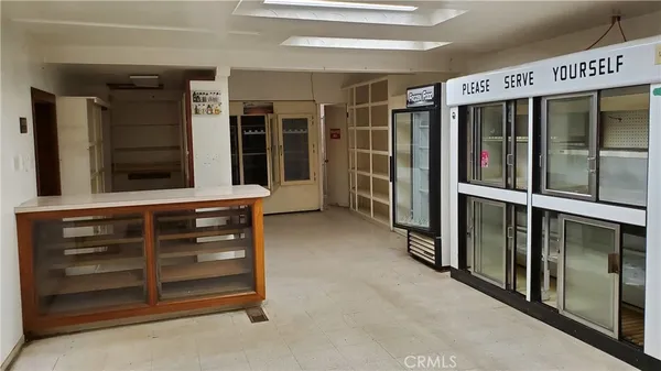 a view of an entryway with a door