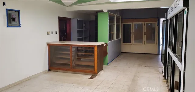 a view of an entryway with front door