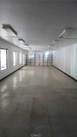 a view of a hall with an empty room