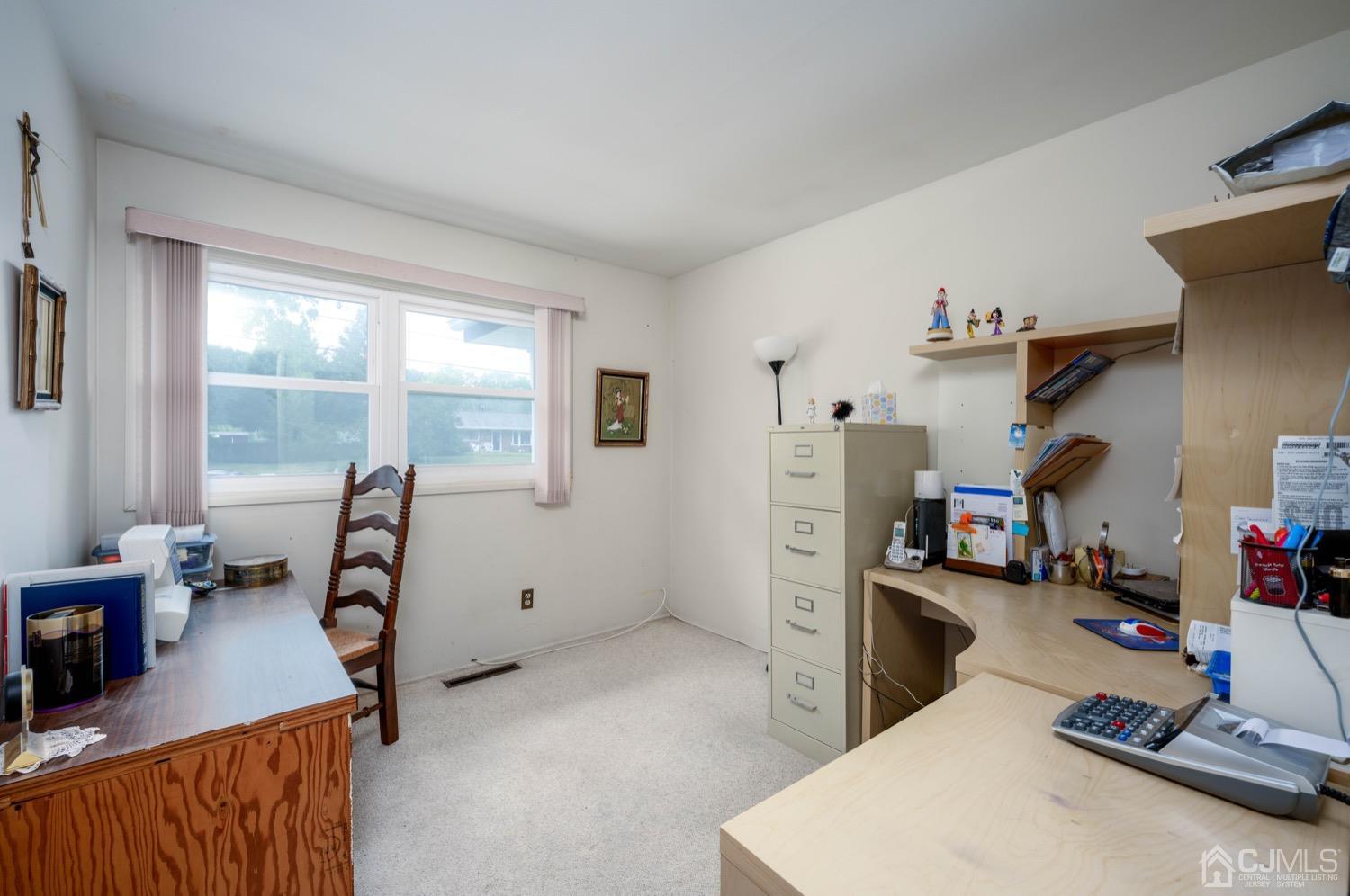 45 Stockton Road Kendall Park, NJ 08824 - Photo 21 of 30 a room with furniture and a wooden floor