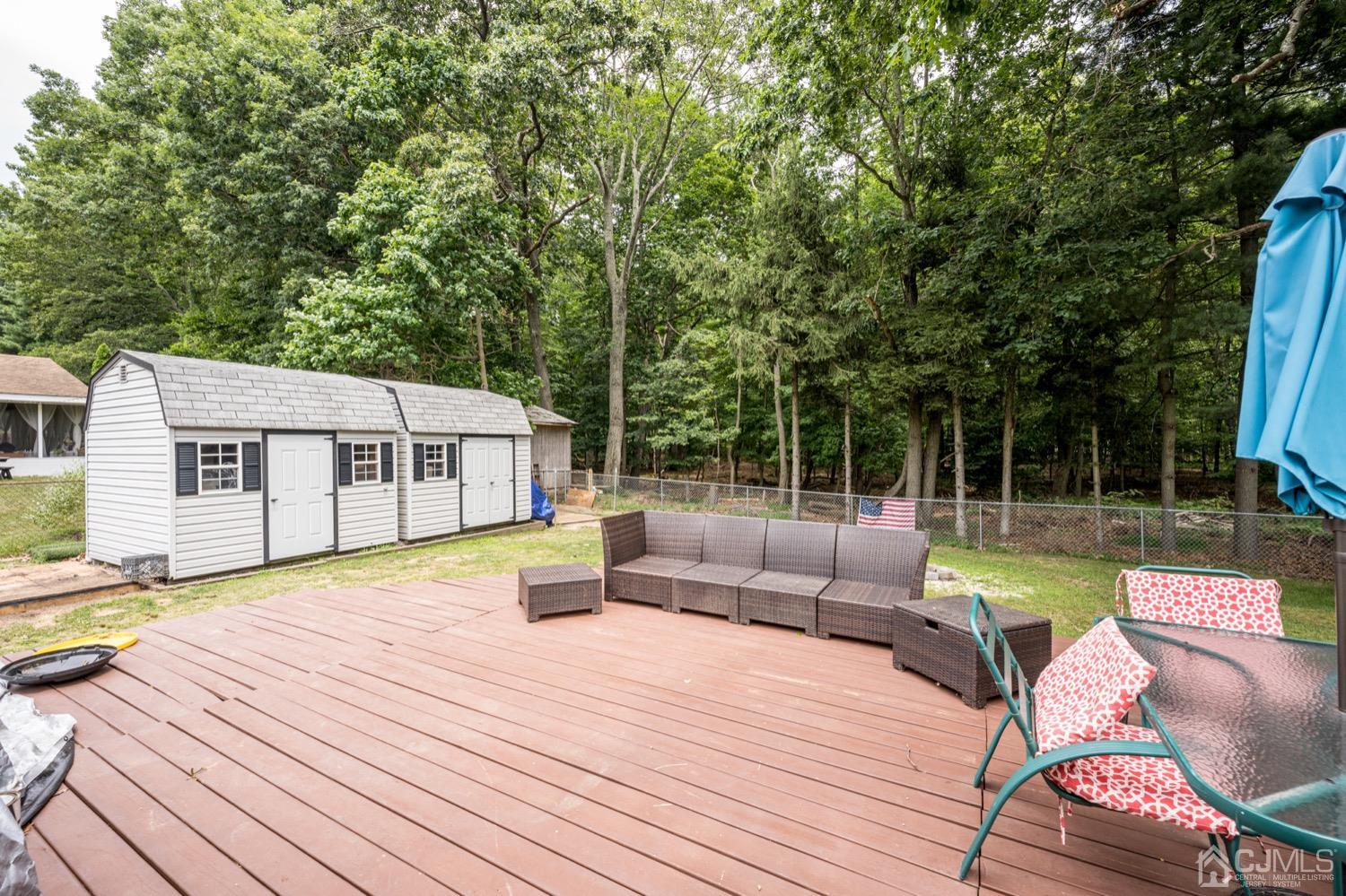 45 Stockton Road Kendall Park, NJ 08824 - Photo 23 of 30 a view of a house with swimming pool and sitting area