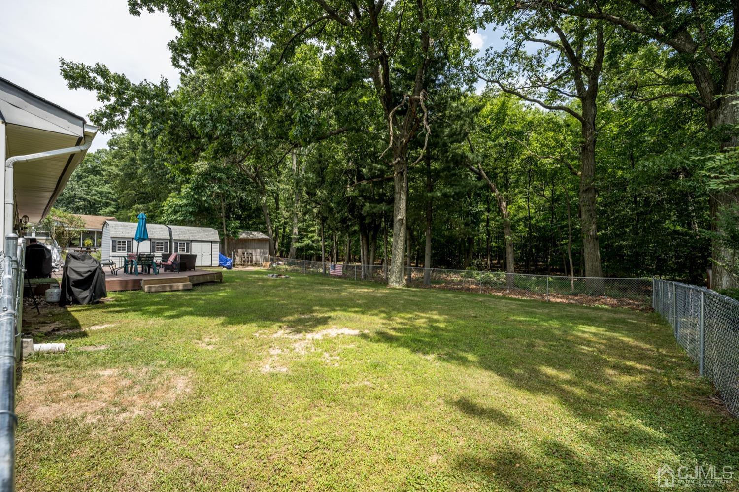 45 Stockton Road Kendall Park, NJ 08824 - Photo 27 of 30 a view of swimming pool with a table and chairs