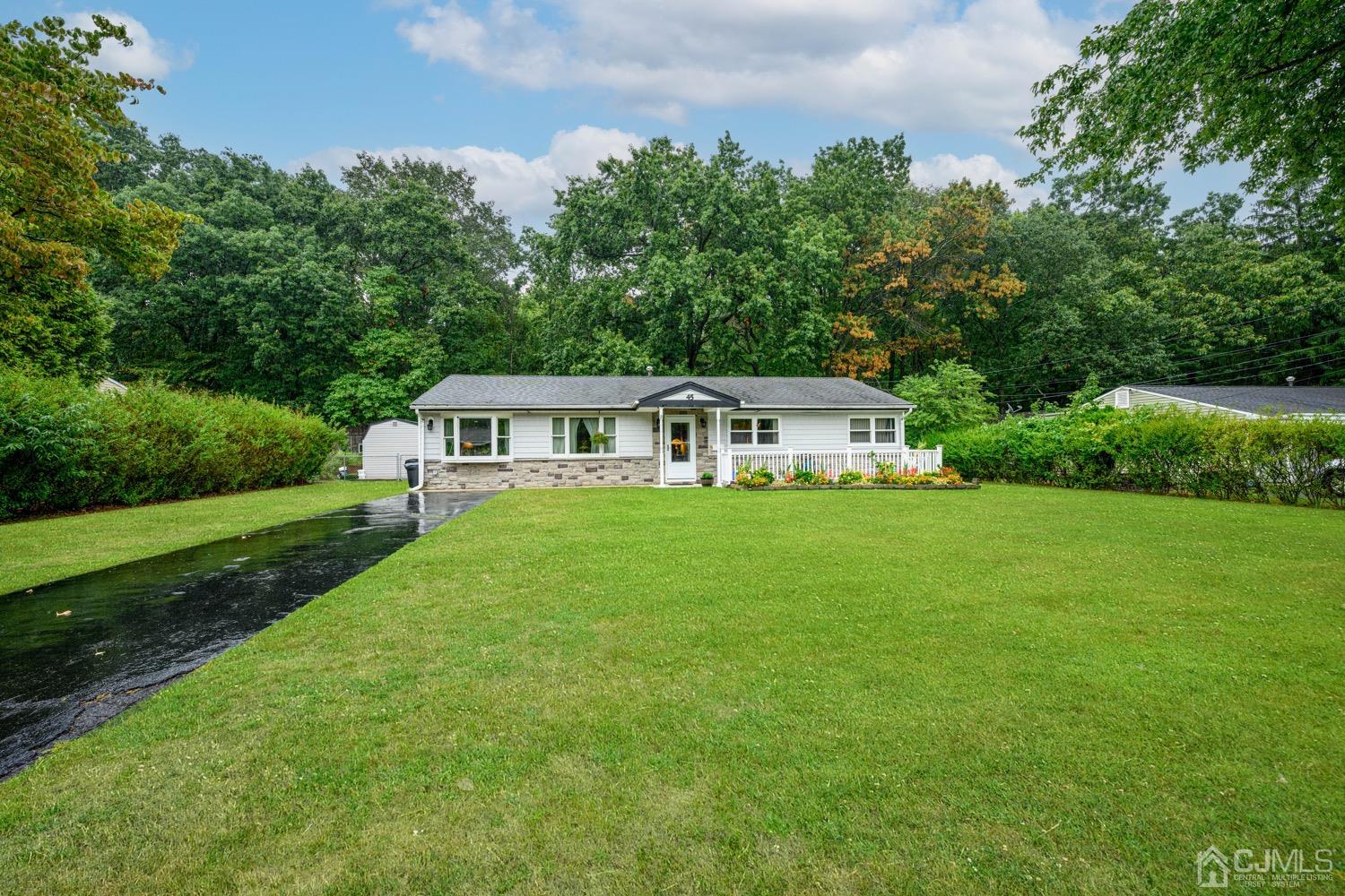 45 Stockton Road Kendall Park, NJ 08824 - Photo 29 of 30 a aerial view of a house with yard and green space