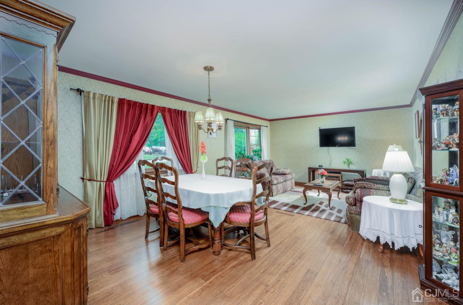 45 Stockton Road Kendall Park, NJ 08824 - Photo 5 of 30 a view of a dining room with furniture window and wooden floor
