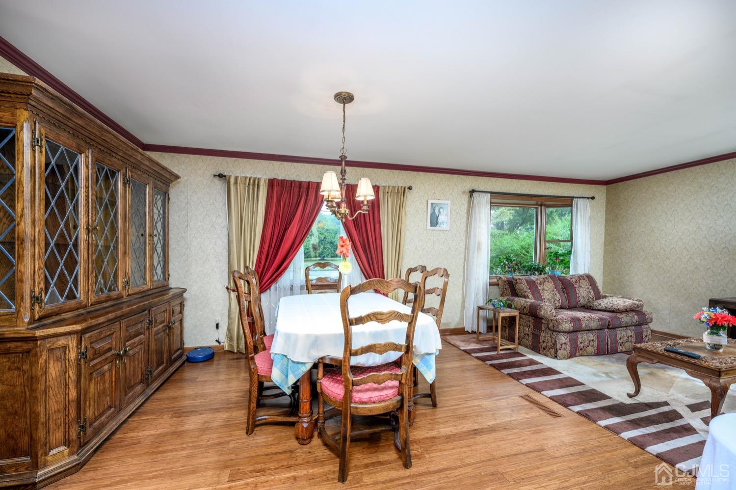 45 Stockton Road Kendall Park, NJ 08824 - Photo 6 of 30 a living room with furniture a window and wooden floor