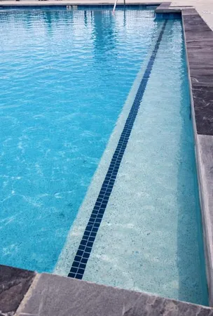 a view of swimming pool with outdoor seating